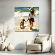 Meisje met hond op het strand