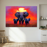 Olifanten familie bij zonsondergang