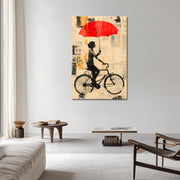 Mit dem Fahrrad mit Regenschirm