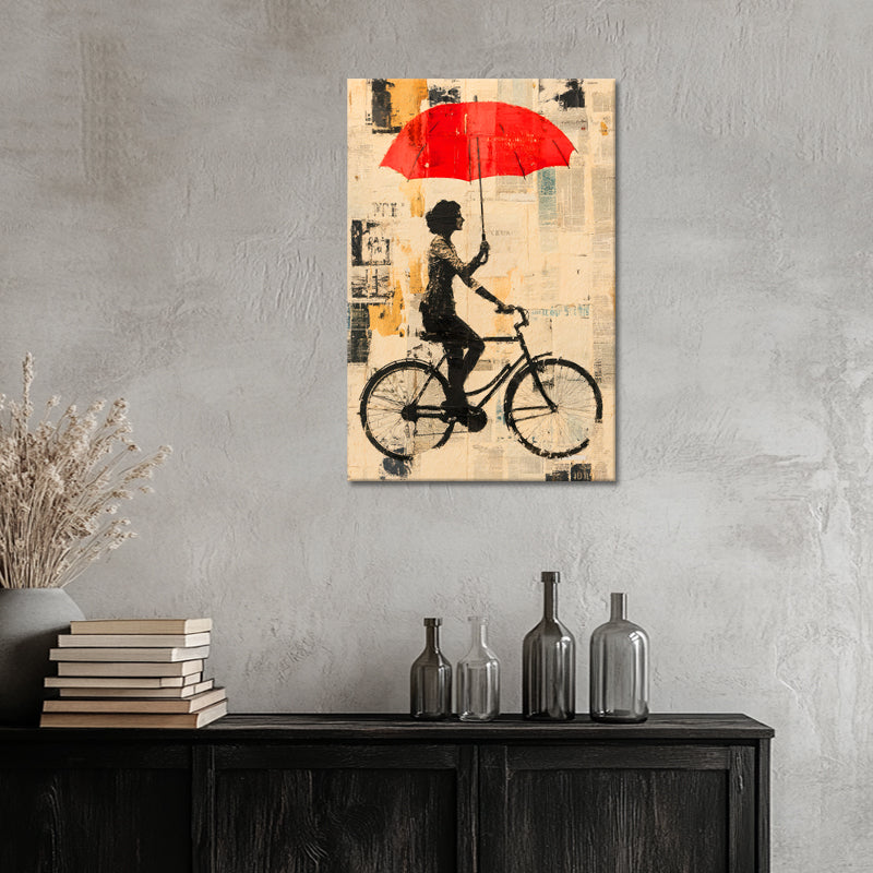 Mit dem Fahrrad mit Regenschirm